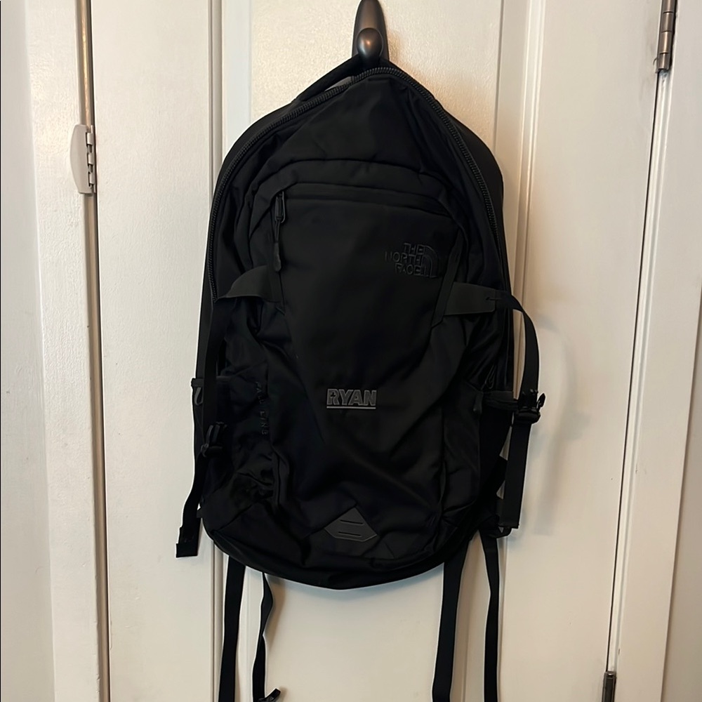 The North Face Black Backpack with Multiple Compartments